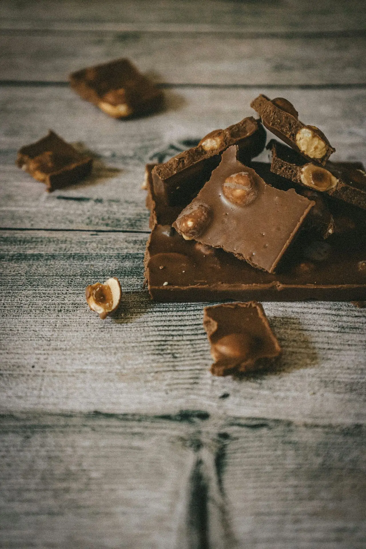 brown chocolate bar on gray wooden table
