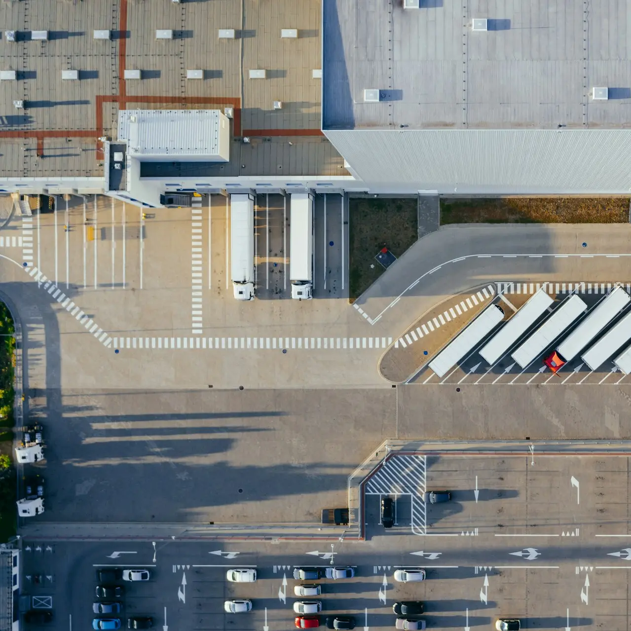 aerial view of vehicles in parking area